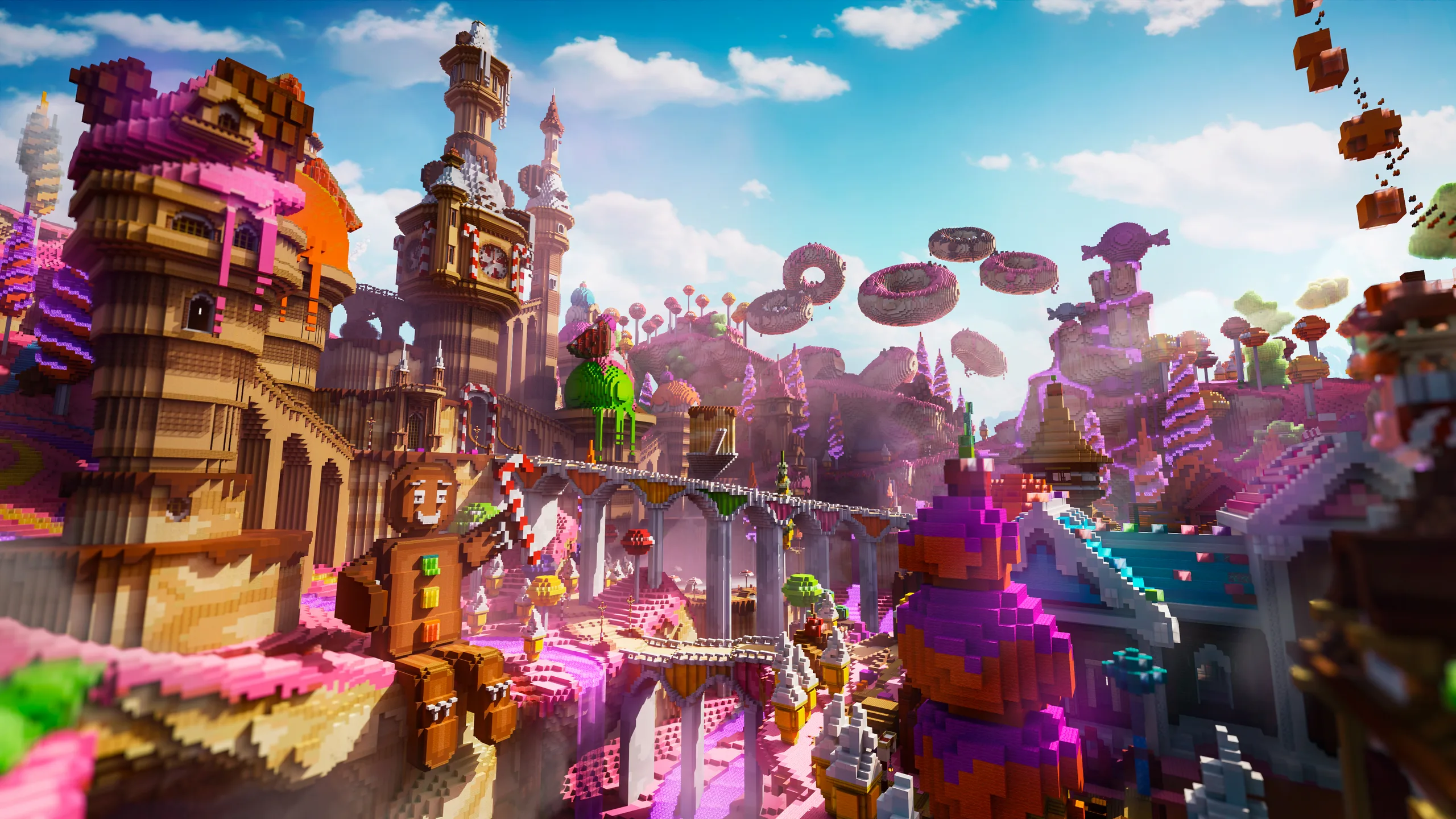 Minecraft cityscape with tall towers, bridges, and curved rooftops in bright pink, purple, and gold, stretching over a canyon under a blue sky.