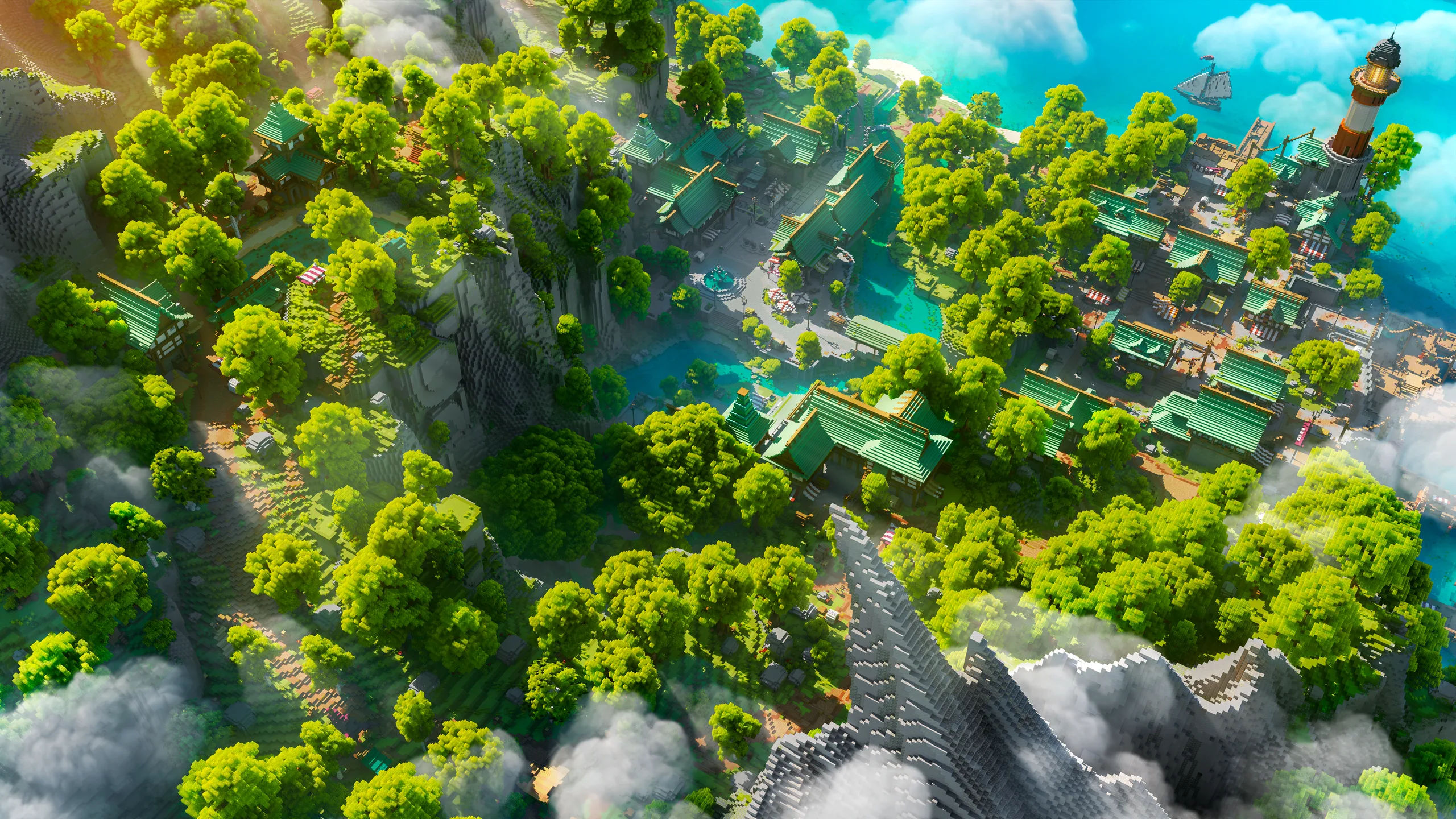 Minecraft build of a lush mountain valley with dense green trees, terraced cliffs, waterfalls, and winding paths. Small teal-roofed buildings and a tall tower sit beside bright blue water under a cloudy sky.